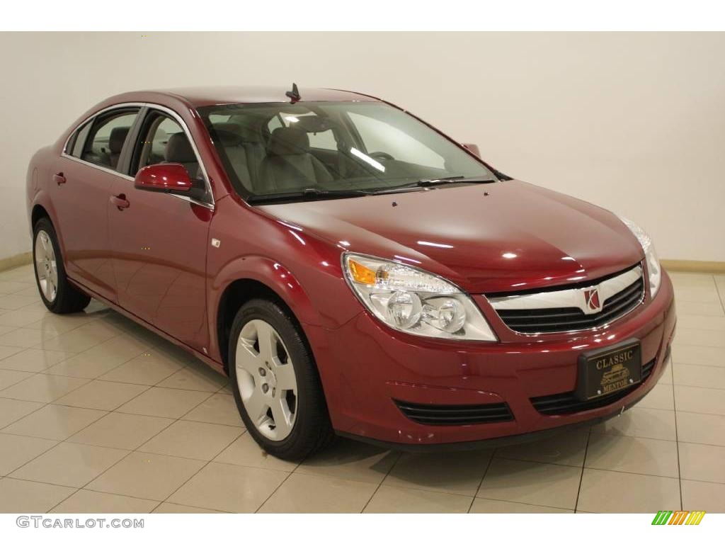 2009 Aura XE - Red Jewel Tintcoat / Tan photo #1
