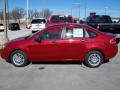 2010 Sangria Red Metallic Ford Focus SE Sedan  photo #2