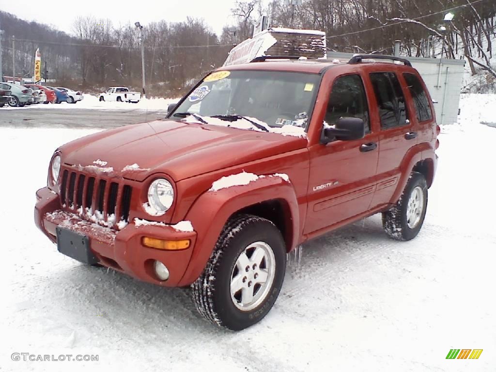 2002 Liberty Limited 4x4 - Salsa Red Pearlcoat / Taupe photo #1