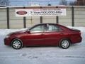 2006 Salsa Red Pearl Toyota Camry LE  photo #1