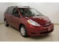 2009 Salsa Red Pearl Toyota Sienna LE  photo #1