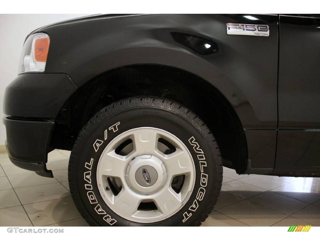 2004 F150 STX SuperCab - Black / Medium/Dark Flint photo #16