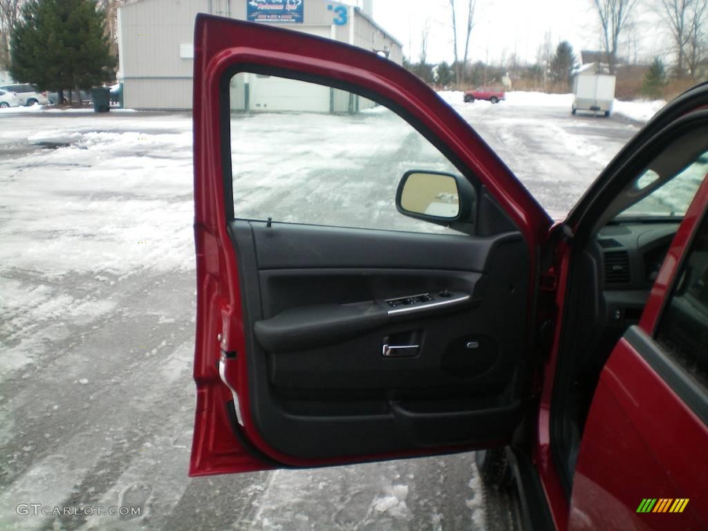 2010 Grand Cherokee Laredo 4x4 - Inferno Red Crystal Pearl / Dark Slate Gray photo #16