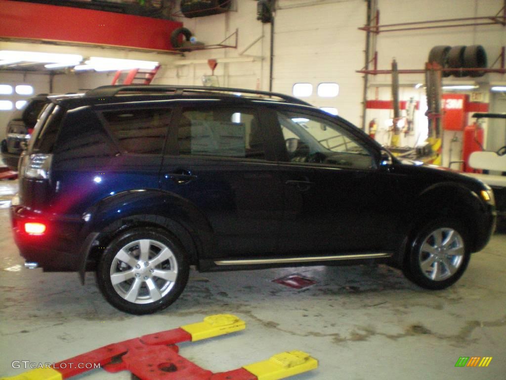 2010 Outlander XLS 4WD - Cosmic Blue Metallic / Black photo #11