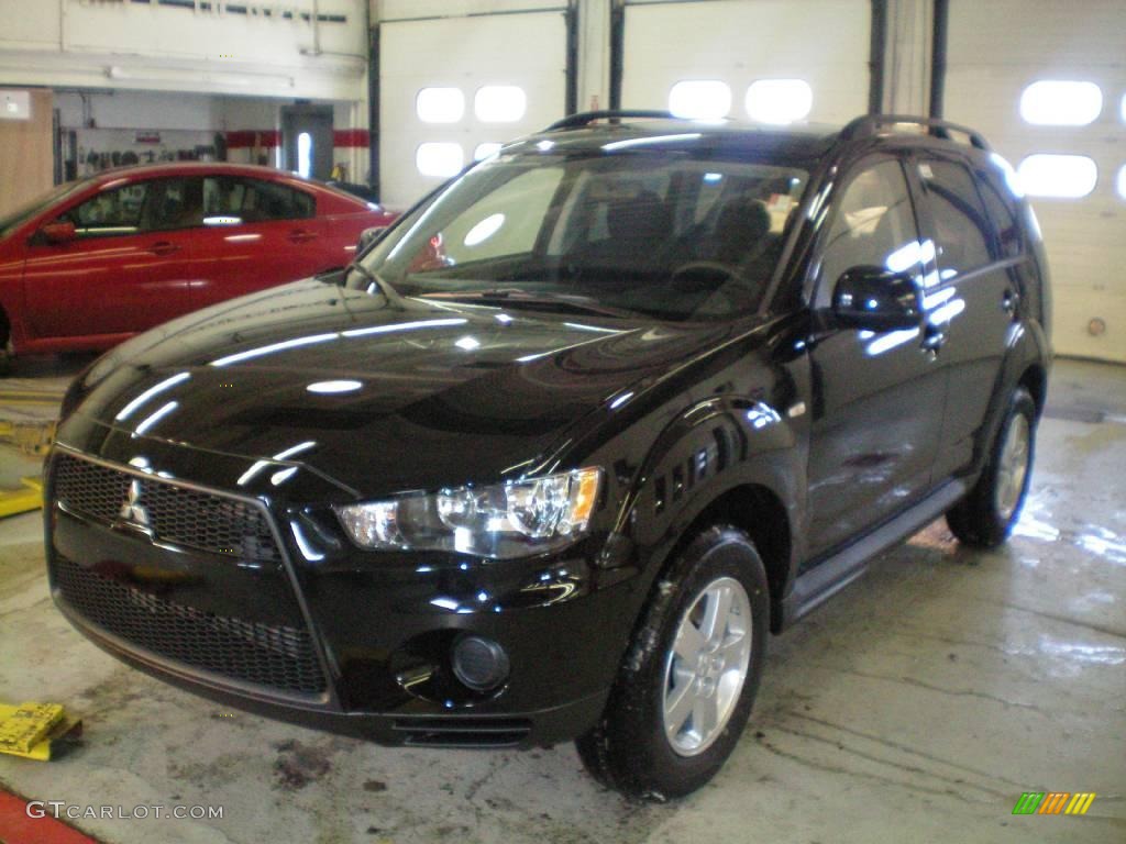 2010 Outlander ES 4WD - Labrador Black Pearl / Black photo #1