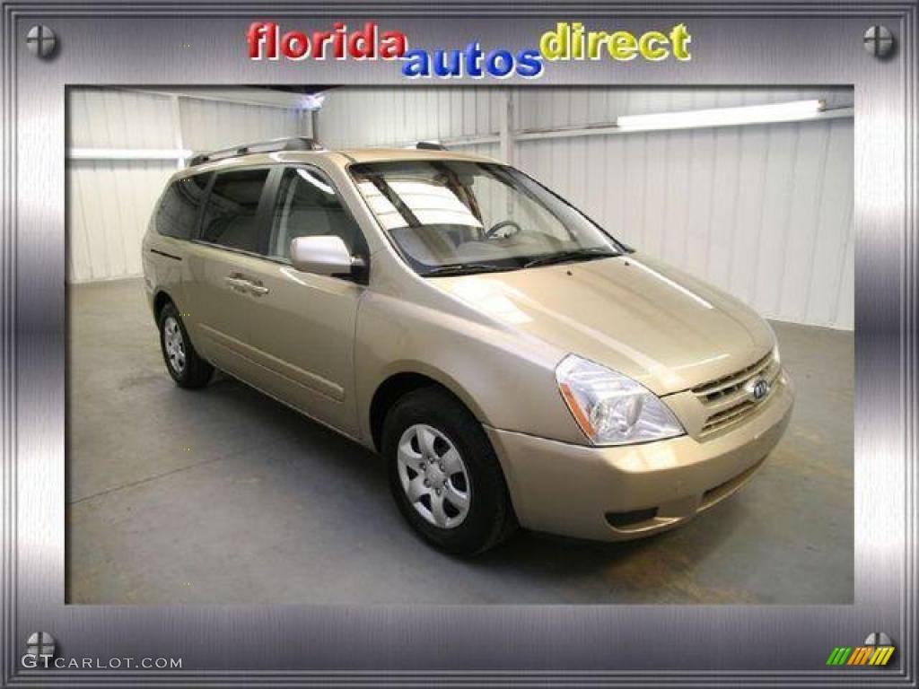 Sunset Gold Metallic Kia Sedona