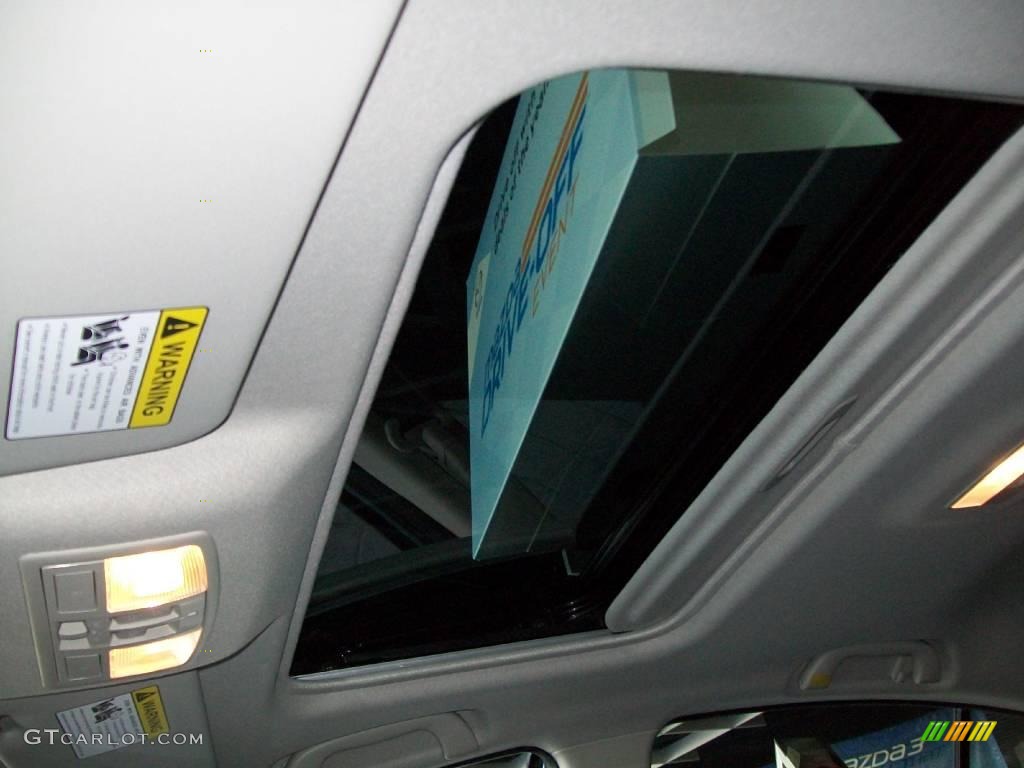 2010 MAZDA3 i Touring 4 Door - Gunmetal Blue Mica / Black photo #11