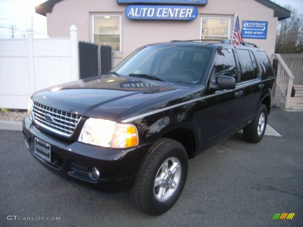2004 Explorer XLT 4x4 - Black / Graphite photo #2