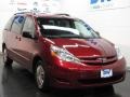 2009 Salsa Red Pearl Toyota Sienna LE  photo #1