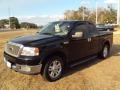 2004 Black Ford F150 Lariat SuperCab  photo #1