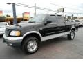Black 2000 Ford F150 Lariat Extended Cab 4x4