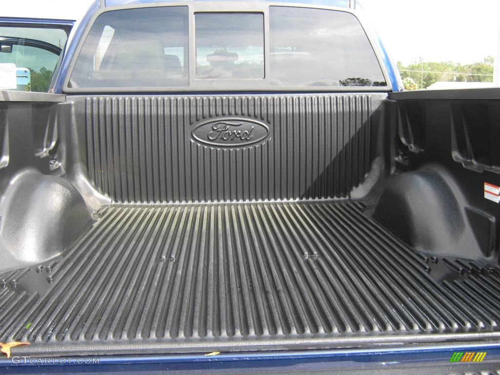 2010 F150 Lariat SuperCrew 4x4 - Dark Blue Pearl Metallic / Tan photo #9