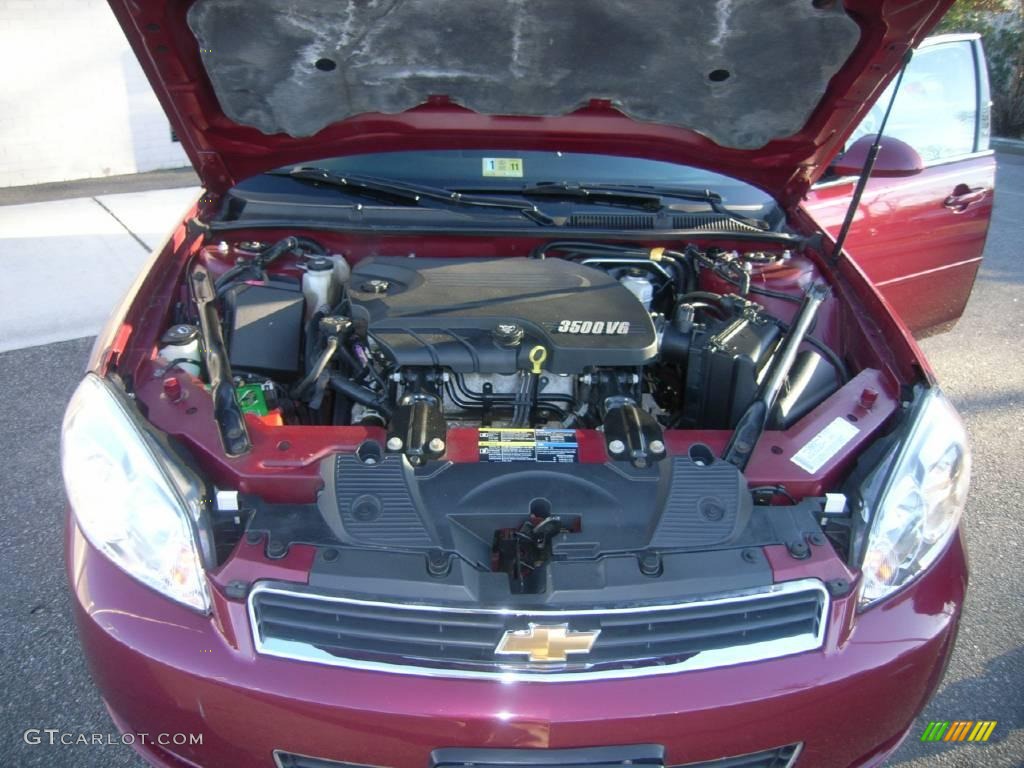 2006 Impala LS - Sport Red Metallic / Ebony Black photo #19