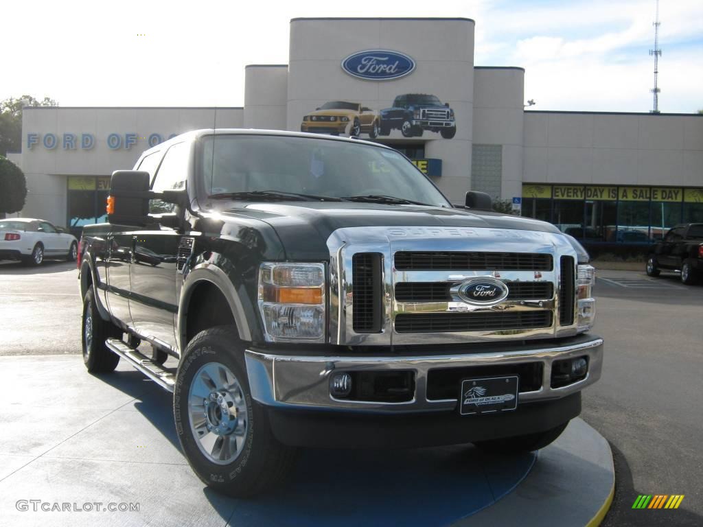 2010 F250 Super Duty Lariat Crew Cab 4x4 - Forest Green Metallic / Camel photo #1