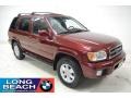 2001 Burnt Cherry Red Pearl Nissan Pathfinder LE  photo #1