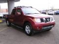 2008 Red Brawn Nissan Frontier LE Crew Cab 4x4  photo #3