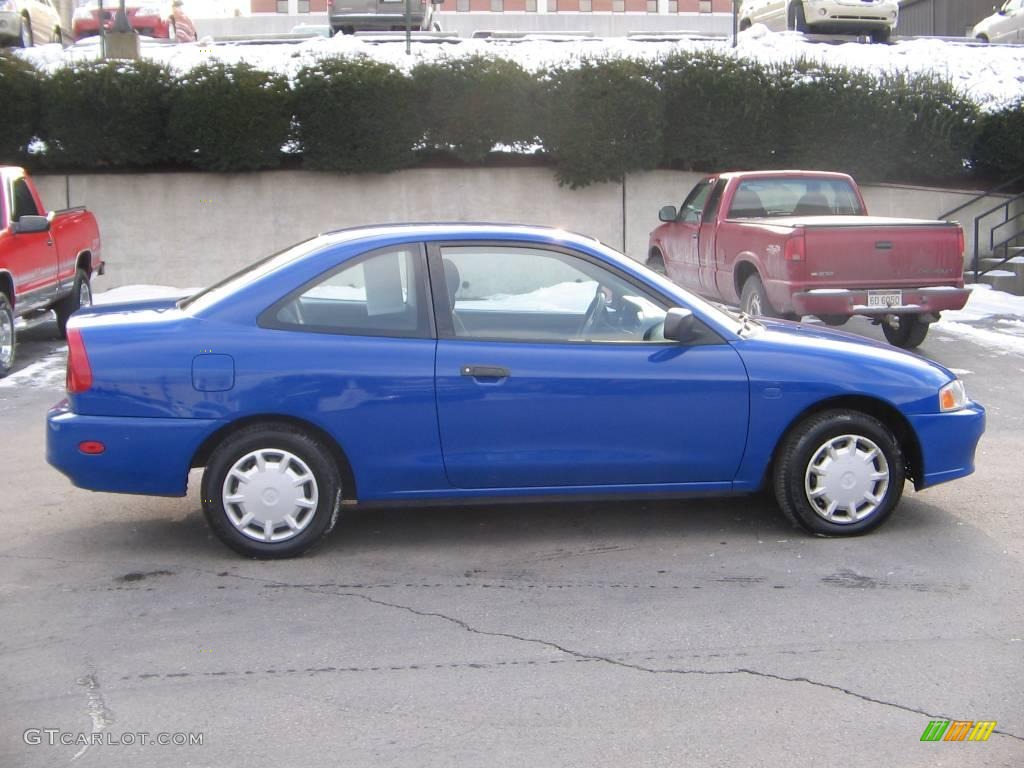 2002 Mirage DE Coupe - Pacific Blue Metallic / Black photo #7