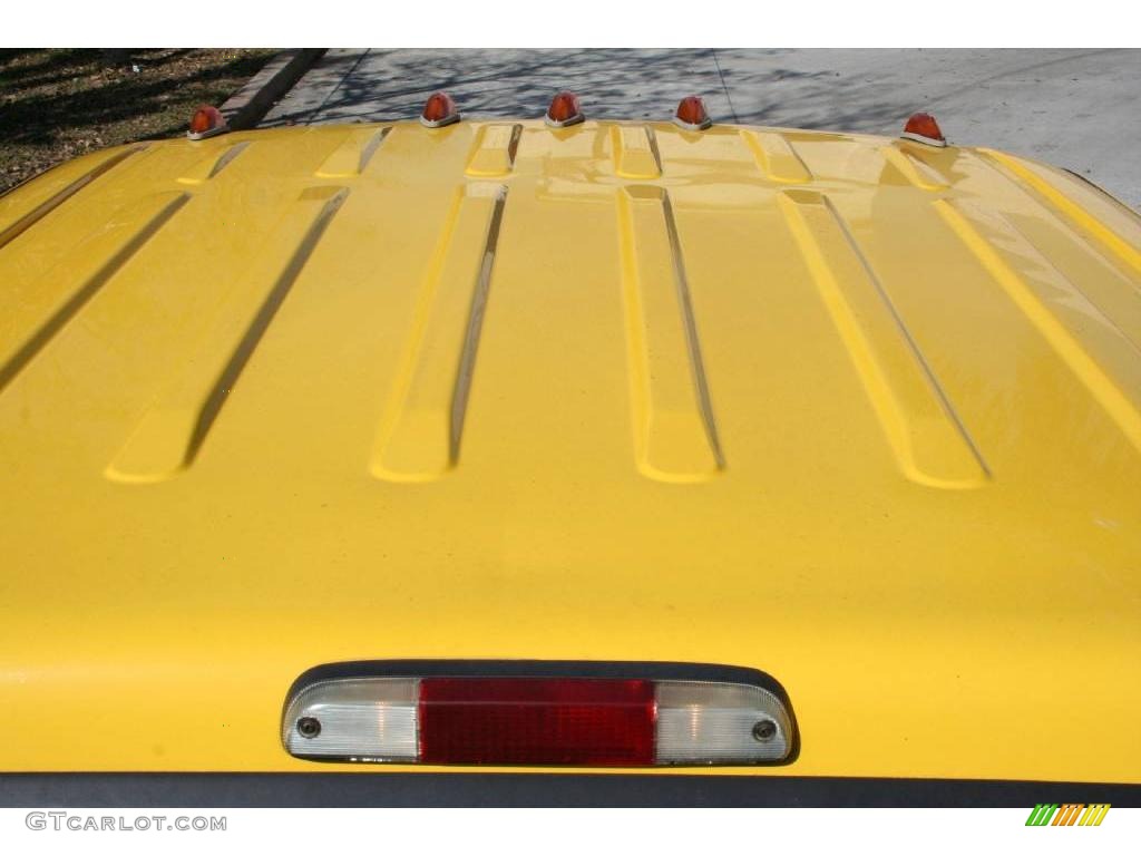 2005 F350 Super Duty FX4 Crew Cab 4x4 - Blazing Yellow / Black photo #20