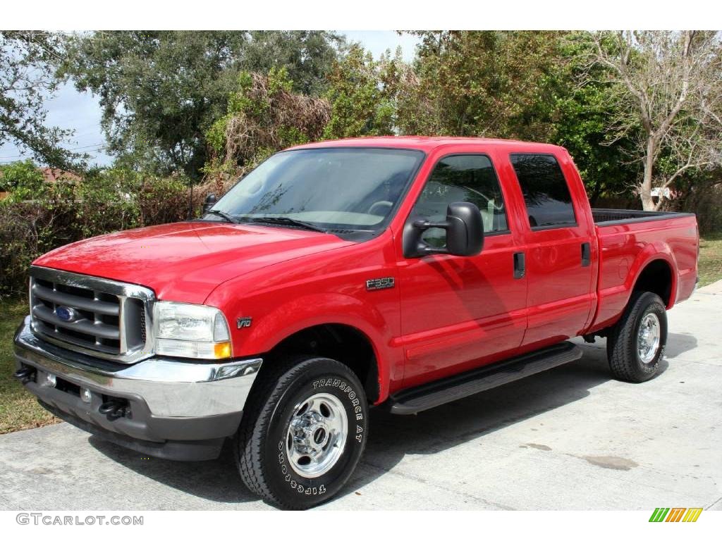 2002 F350 Super Duty Lariat Crew Cab 4x4 - Red / Medium Parchment photo #1