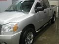 2006 Radiant Silver Nissan Titan LE Crew Cab 4x4  photo #19