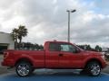 2009 Bright Red Ford F150 STX SuperCab 4x4  photo #2