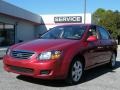 2009 Spicy Red Metallic Kia Spectra EX Sedan  photo #1