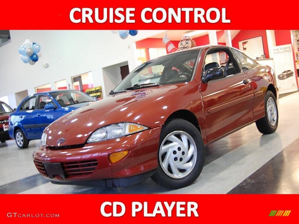 1998 Cavalier Coupe - Cayenne Red Metallic / Gray photo #1