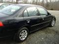 Black - E 320 4Matic Wagon Photo No. 30