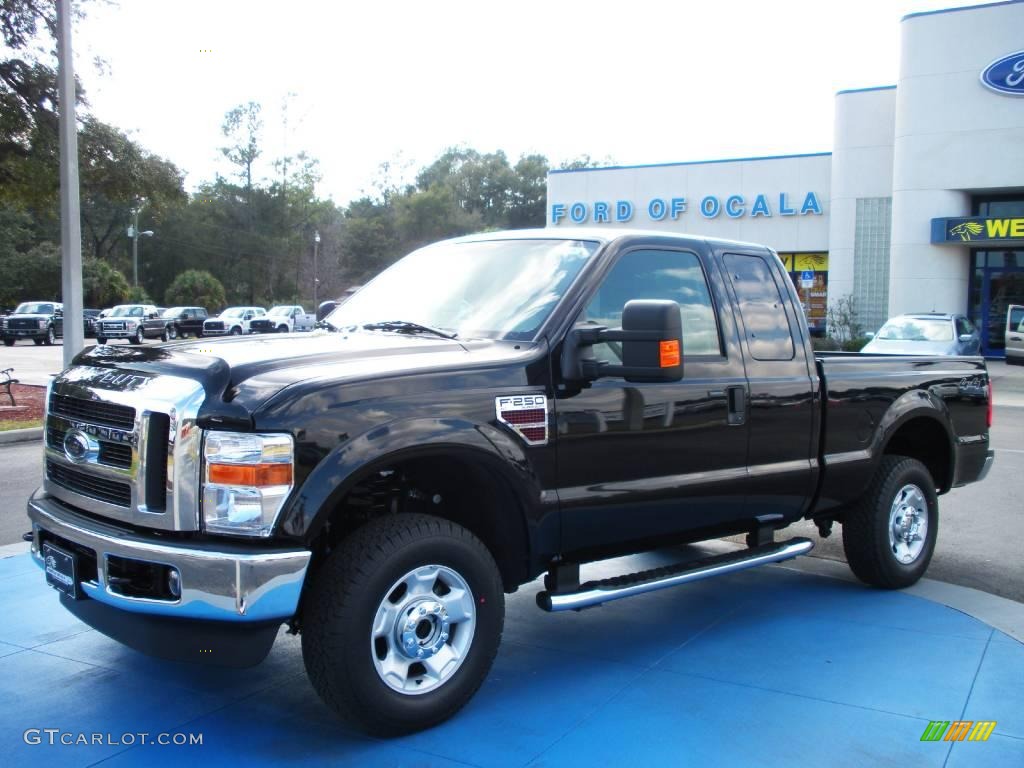 2010 F250 Super Duty XLT SuperCab 4x4 - Black / Medium Stone photo #1