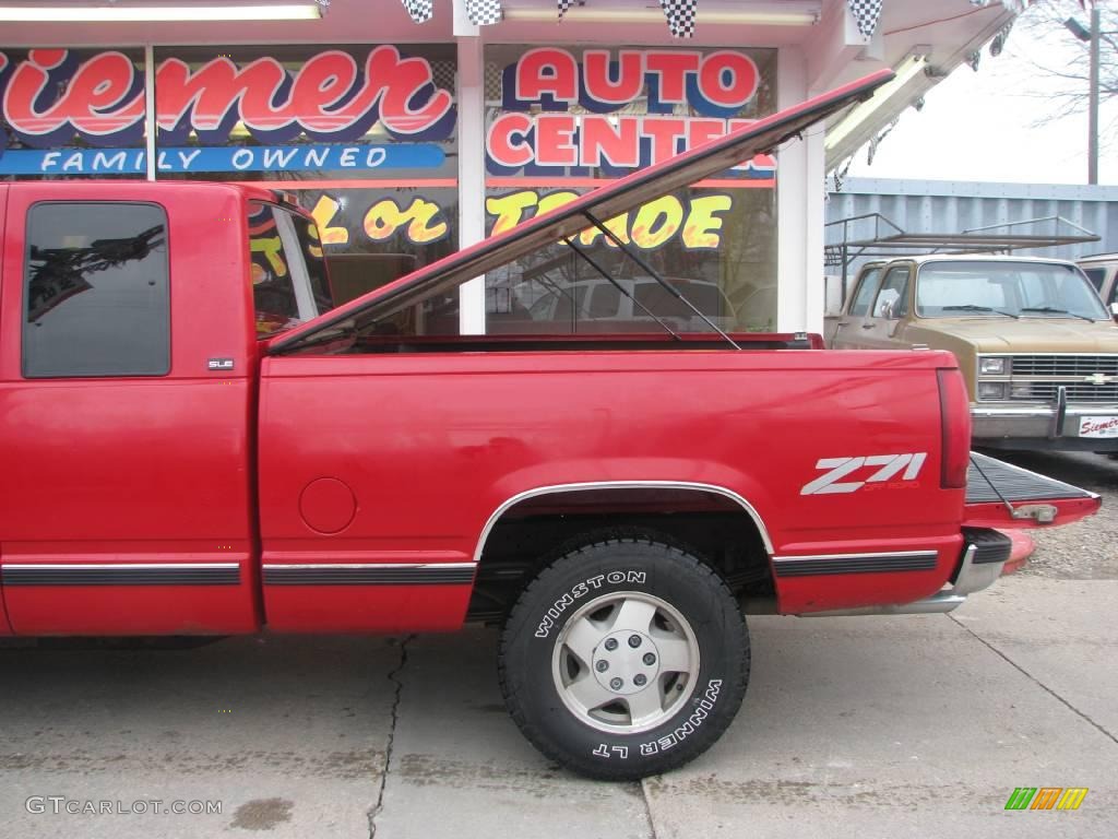 1994 Sierra 1500 SLE Extended Cab 4x4 - Fire Red / Gray photo #7