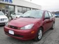 2004 Sangria Red Metallic Ford Focus SE Sedan  photo #1