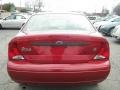 2004 Sangria Red Metallic Ford Focus SE Sedan  photo #16