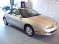 1999 Gold Saturn S Series SC2 Coupe  photo #1