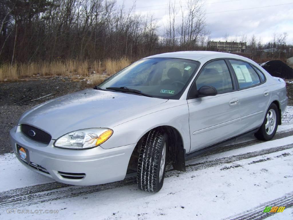 Silver Frost Metallic Ford Taurus