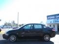 2010 Ebony Black Ford Focus SE Sedan  photo #2