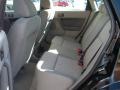 2010 Ebony Black Ford Focus SE Sedan  photo #5