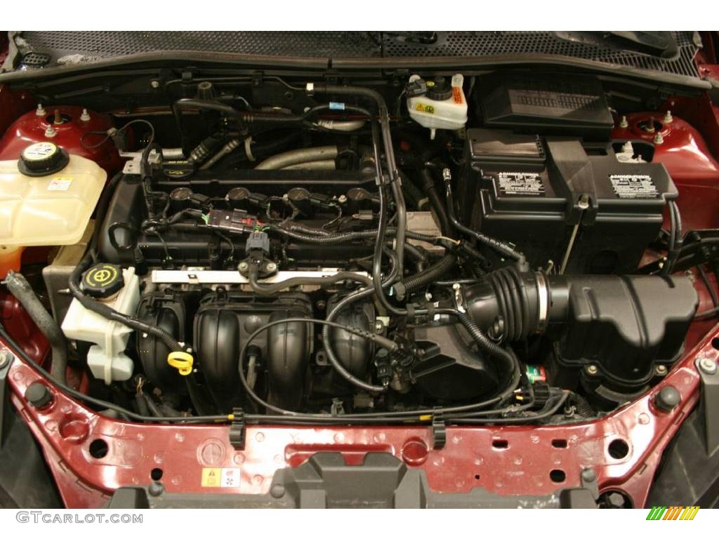 2006 Focus ZX4 SE Sedan - Dark Toreador Red Metallic / Dark Flint/Light Flint photo #18