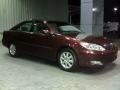 2003 Salsa Red Pearl Toyota Camry XLE  photo #16