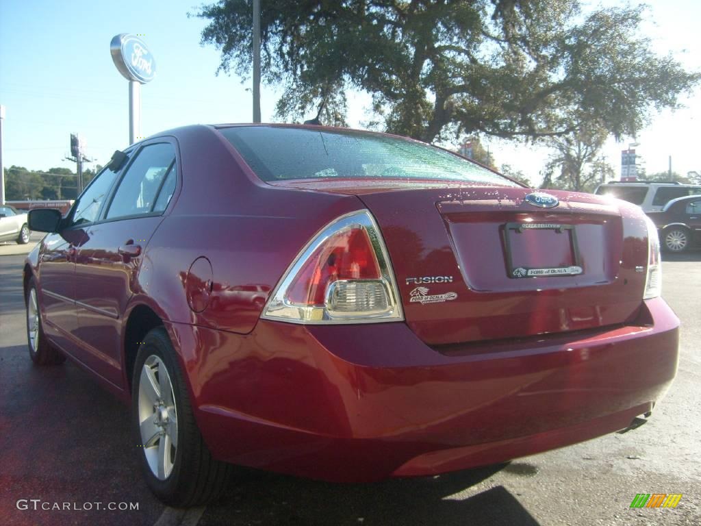 2008 Fusion SE - Redfire Metallic / Charcoal Black photo #5