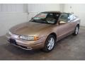 1999 Gold Metallic Oldsmobile Alero GL Coupe  photo #6