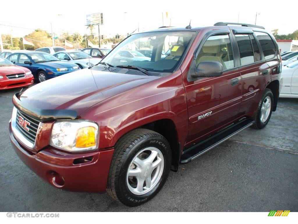 Magnetic Red Metallic GMC Envoy