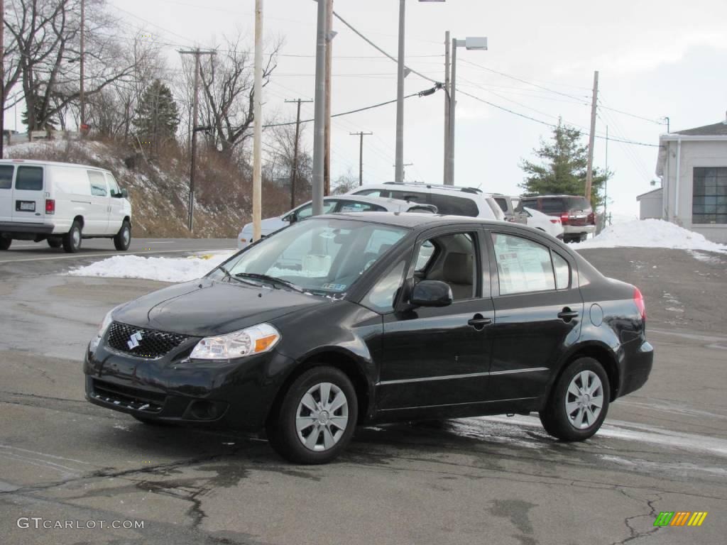 2009 SX4 Sedan - Black Pearl Metallic / Beige photo #5