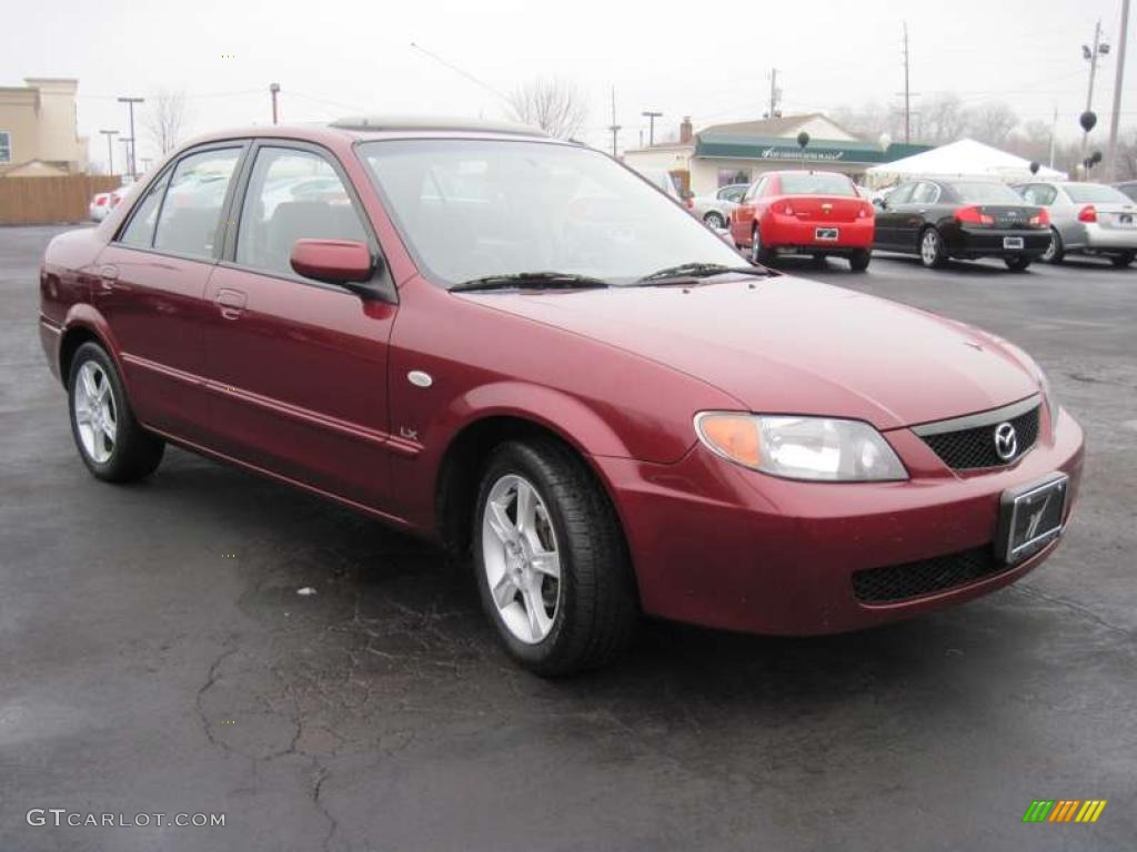 2003 Protege LX - Garnet Red Mica / Gray photo #14