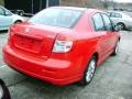 2009 Vivid Red Suzuki SX4 Touring Sport Sedan  photo #2