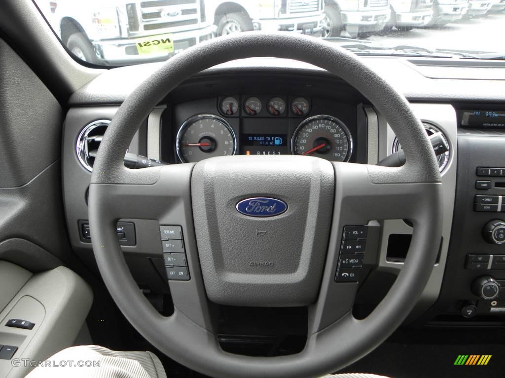 2010 F150 XLT Regular Cab - Tuxedo Black / Medium Stone photo #17