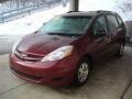 2009 Salsa Red Pearl Toyota Sienna LE  photo #5