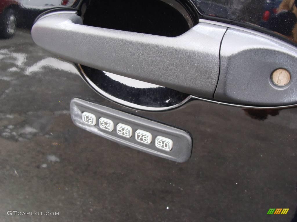 2009 Escape XLT V6 4WD - Black Pearl Slate Metallic / Camel photo #9