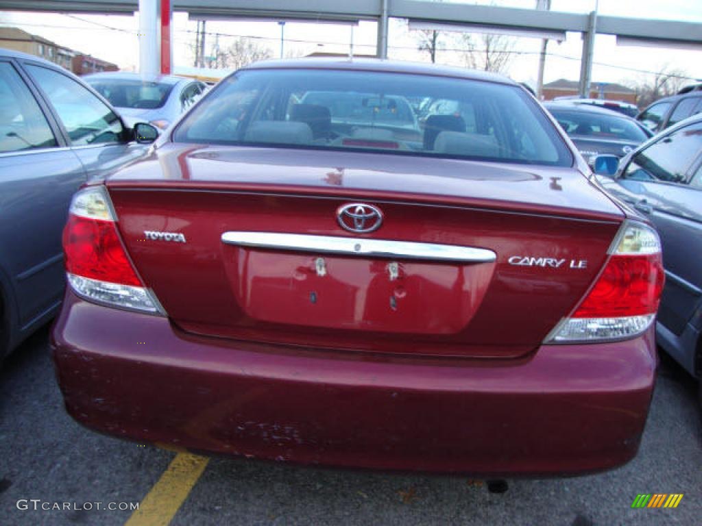 2006 Camry LE - Salsa Red Pearl / Taupe photo #25