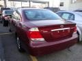 2006 Salsa Red Pearl Toyota Camry LE  photo #26