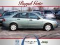 2006 Light Tundra Metallic Ford Focus ZX4 SE Sedan  photo #1